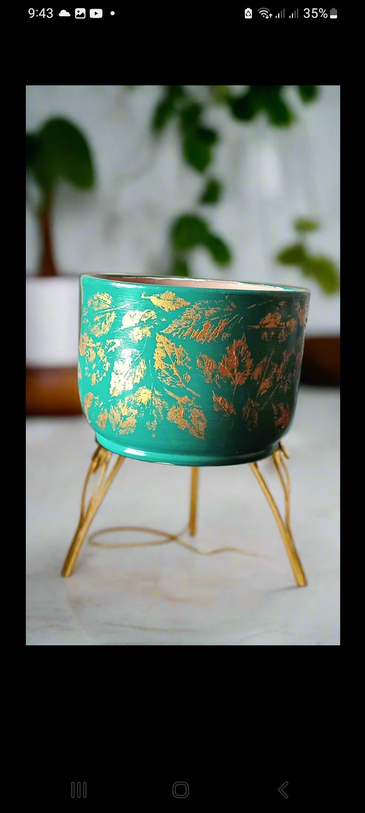 Leaf printing with gold on a turquoise green pot___ hand-painted